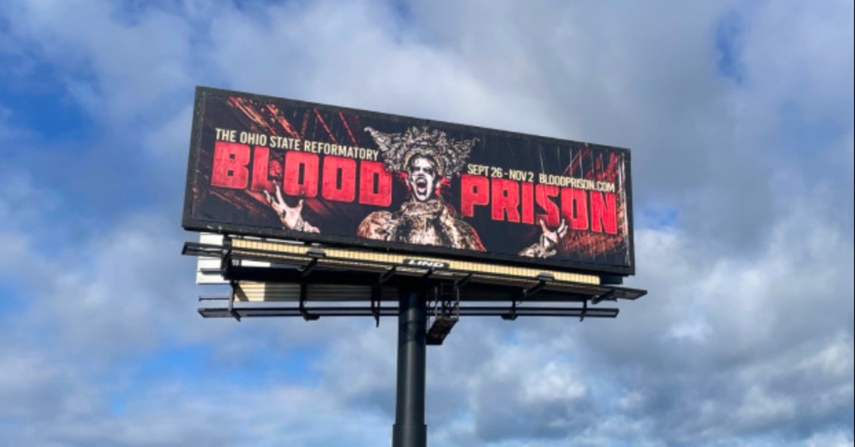 Ohio State Reformatory Blood Prison Concert banner against a bright blue sky