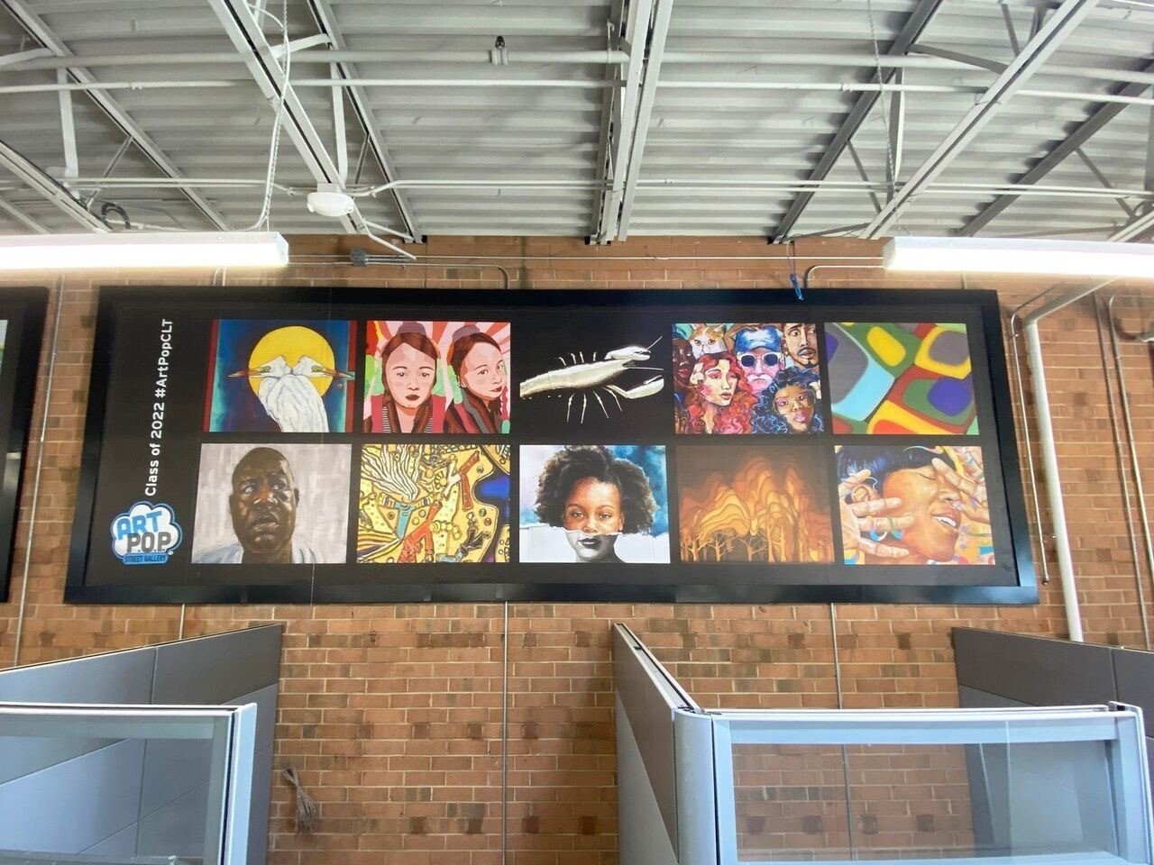 Art-Pop-Street-Gallery-Class-Of-2022-10x30-bannerframe-classic-on-brick-interior-7oz-mesh Wallscape Of The Week: Make Your Art POP!