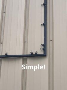 Close-up-of-Frame-225x300 Great Walls are a Terrible Thing to Waste— Lind Offers Simple Banner Installation!