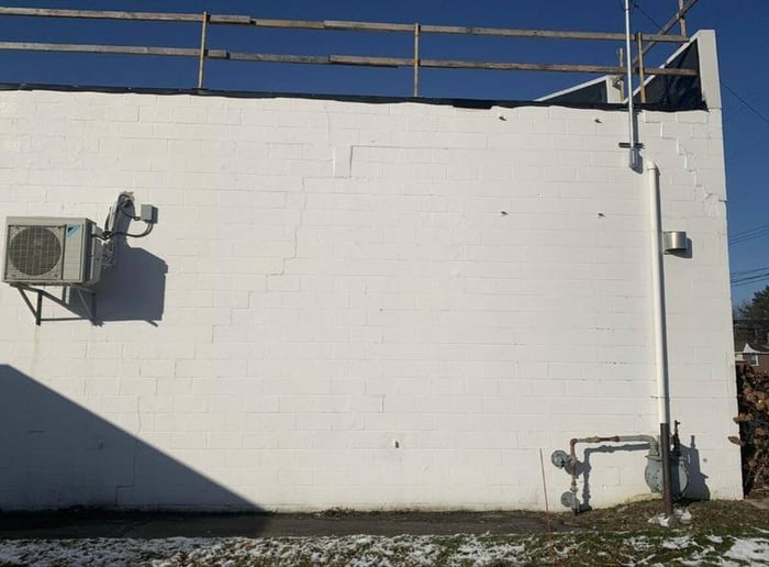 Comfort-Control-blank-wall-ready-for-their-banner-frame-install-Ashland-Ohio Banner Frame Installation: 40 Years of Comfort