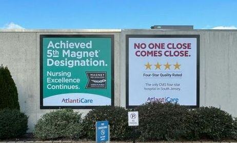 Lind-SignSpring-BannerFrame-Classic-AtlantiCare-2-billboards Sign Shops Love Lind Banner Frame