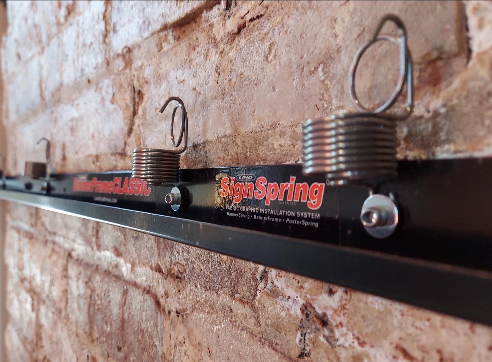 Lind-SignSpring-BannerFrame-Spring-Close-up Wallscape Of The Week: Small Towns Build Great Things