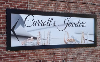 Wallscape of The Week: Carroll’s Jewelers Shines with Lind SignSpring BannerFrameHINGE