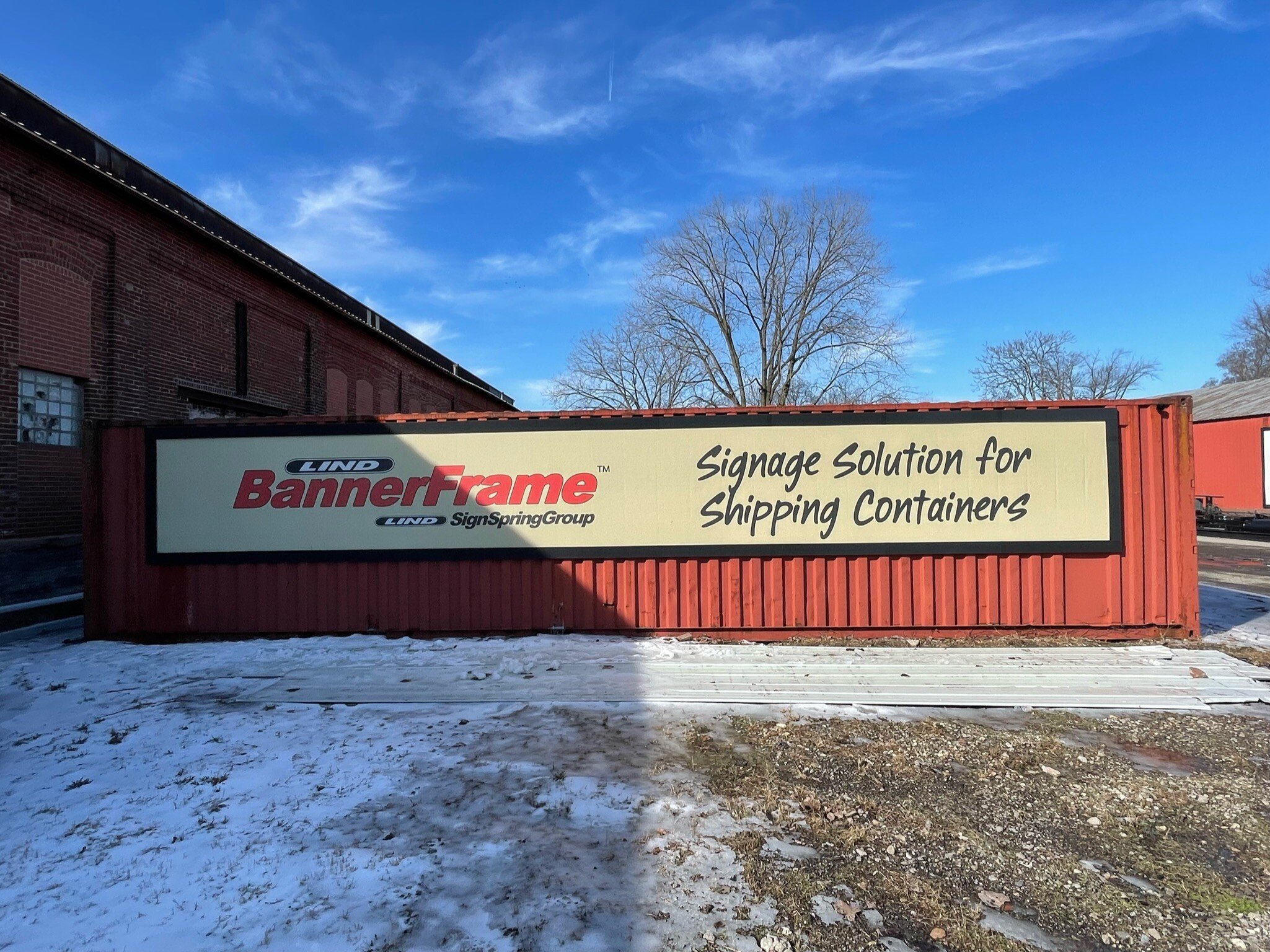 lind-signspring-bannerframe-classic-banner-installation-system-shipping-container-classic Do You Need to Get Your Message Moving?