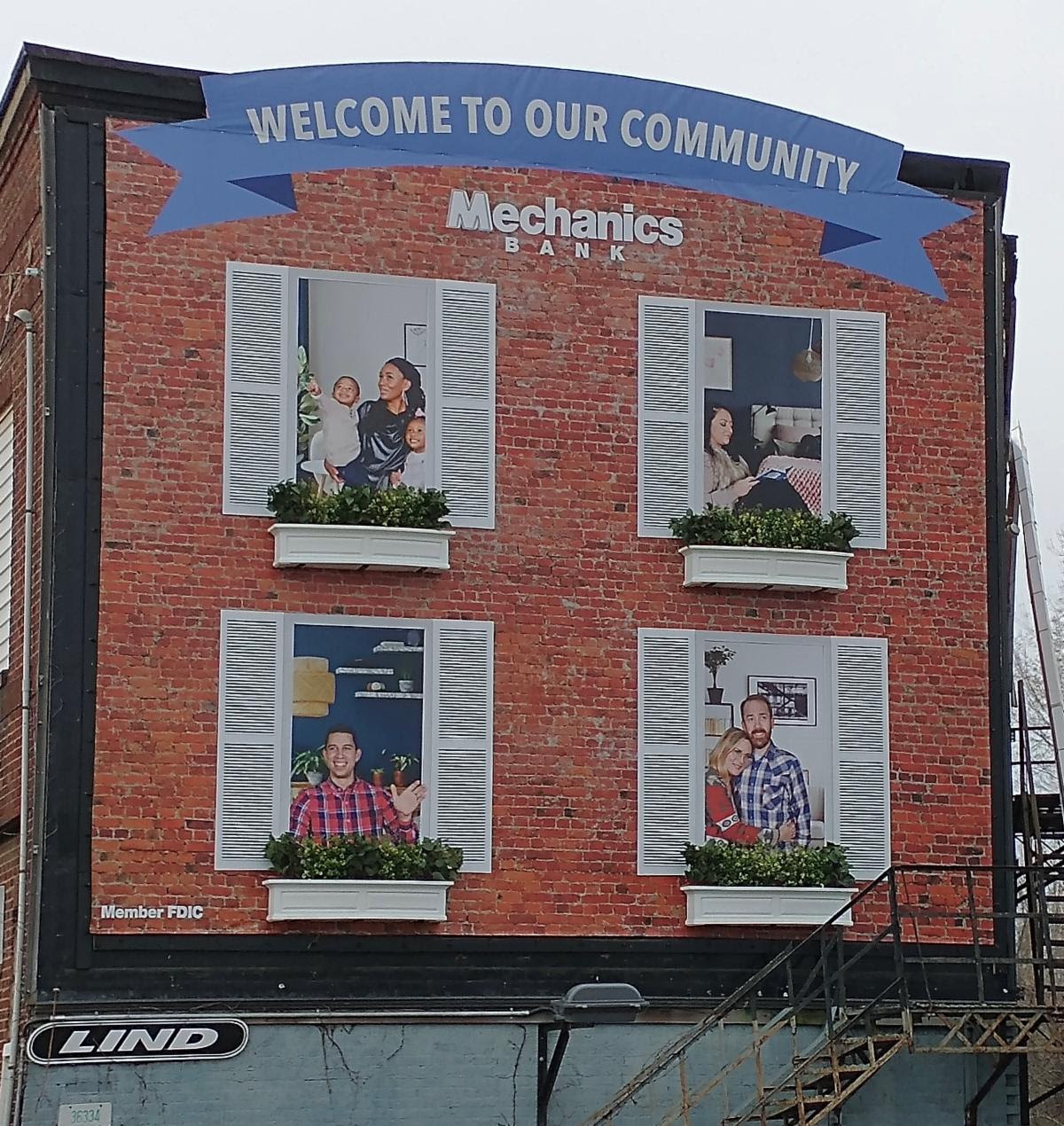 mechanics-bank-wallscape-neighbor-windows-lind-signspring Install Banners Better