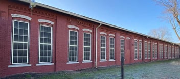 Building Restoration: Lind SignSpring Banners Aren’t Just For Marketing