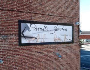 Carolls-Jewelers-Completion-Lind-SignSpring-BannerFrame-Hinge-300x233 Gallery