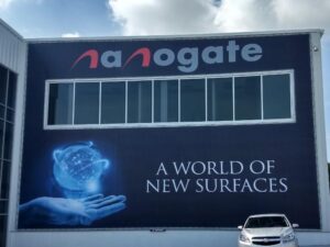 Nonogate-banner-hung-on-side-of-building-300x225 Kickin' Glass and Taking Names! Lind BannerFrame Classic Has Your Retail Signage Covered!