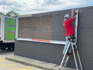 IMG_2277-300x225 Easy banner change-outs For McDonald's with BannerFrame Hinge!